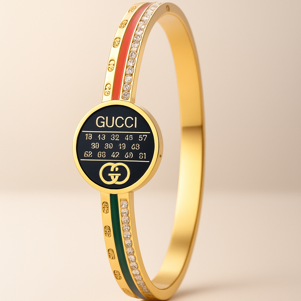 Gold bracelet with Gucci logo on a beige background