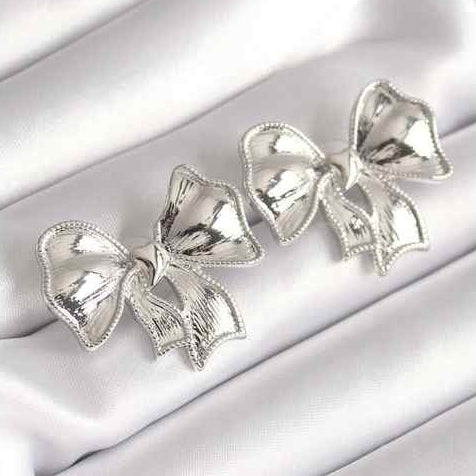 Gold bow-shaped earrings