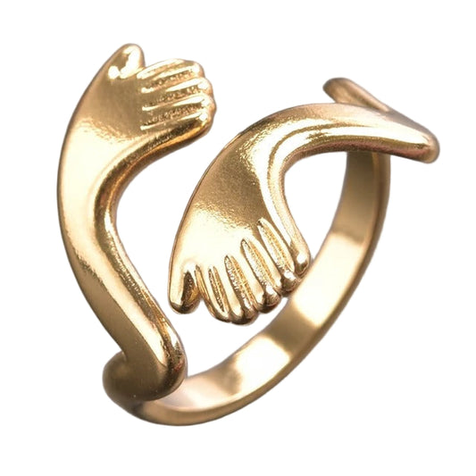 Gold ring with hand-shaped design