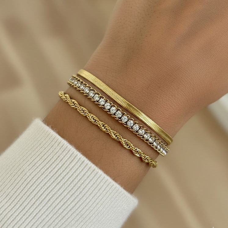 Three gold bracelets