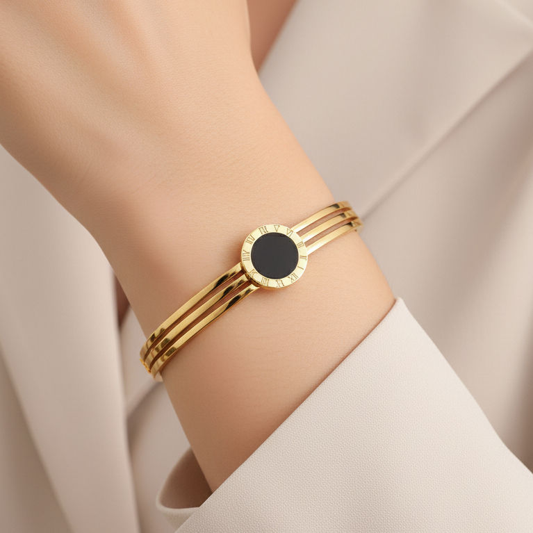 Gold bracelet with a black