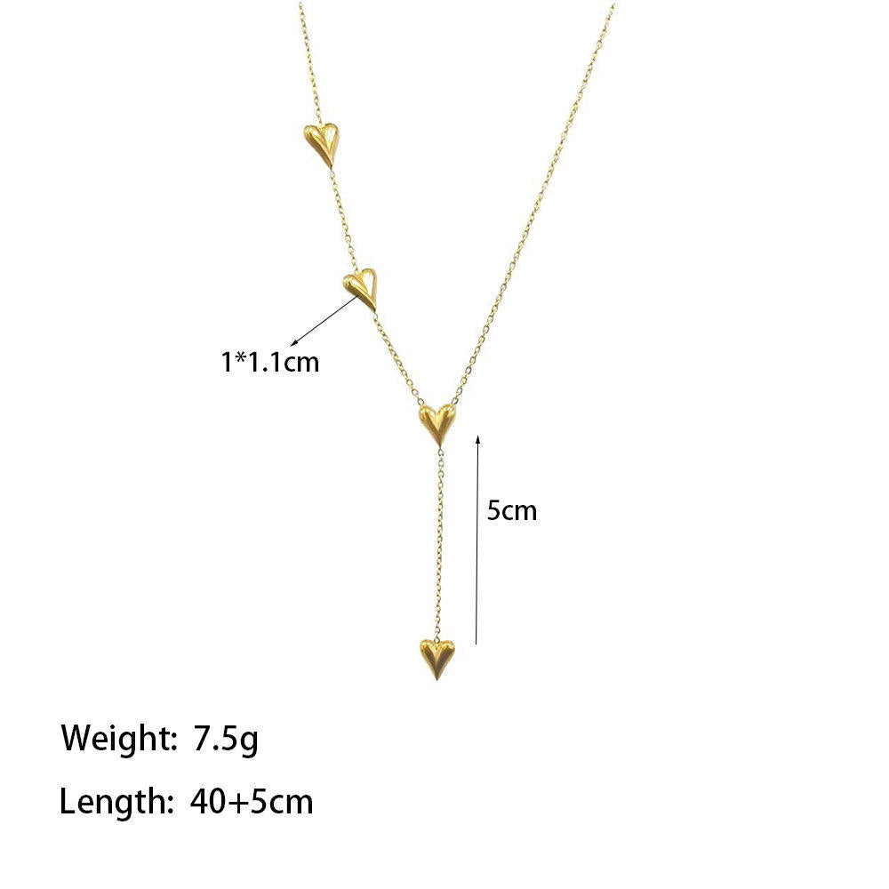 Gold necklace with heart-shaped pendant