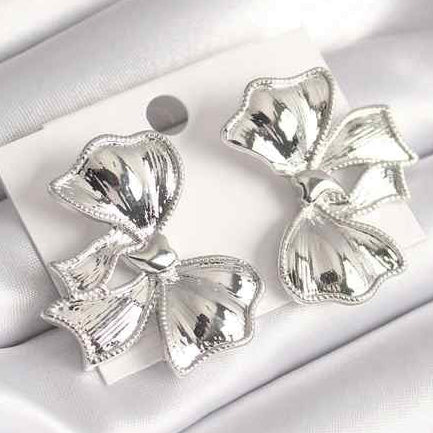 silver bow-shaped earrings